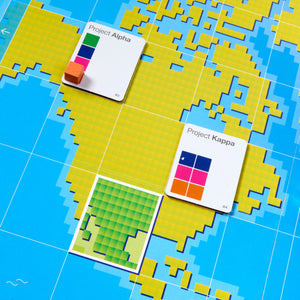 Colorful geometric tiles and cards on a blue grid background